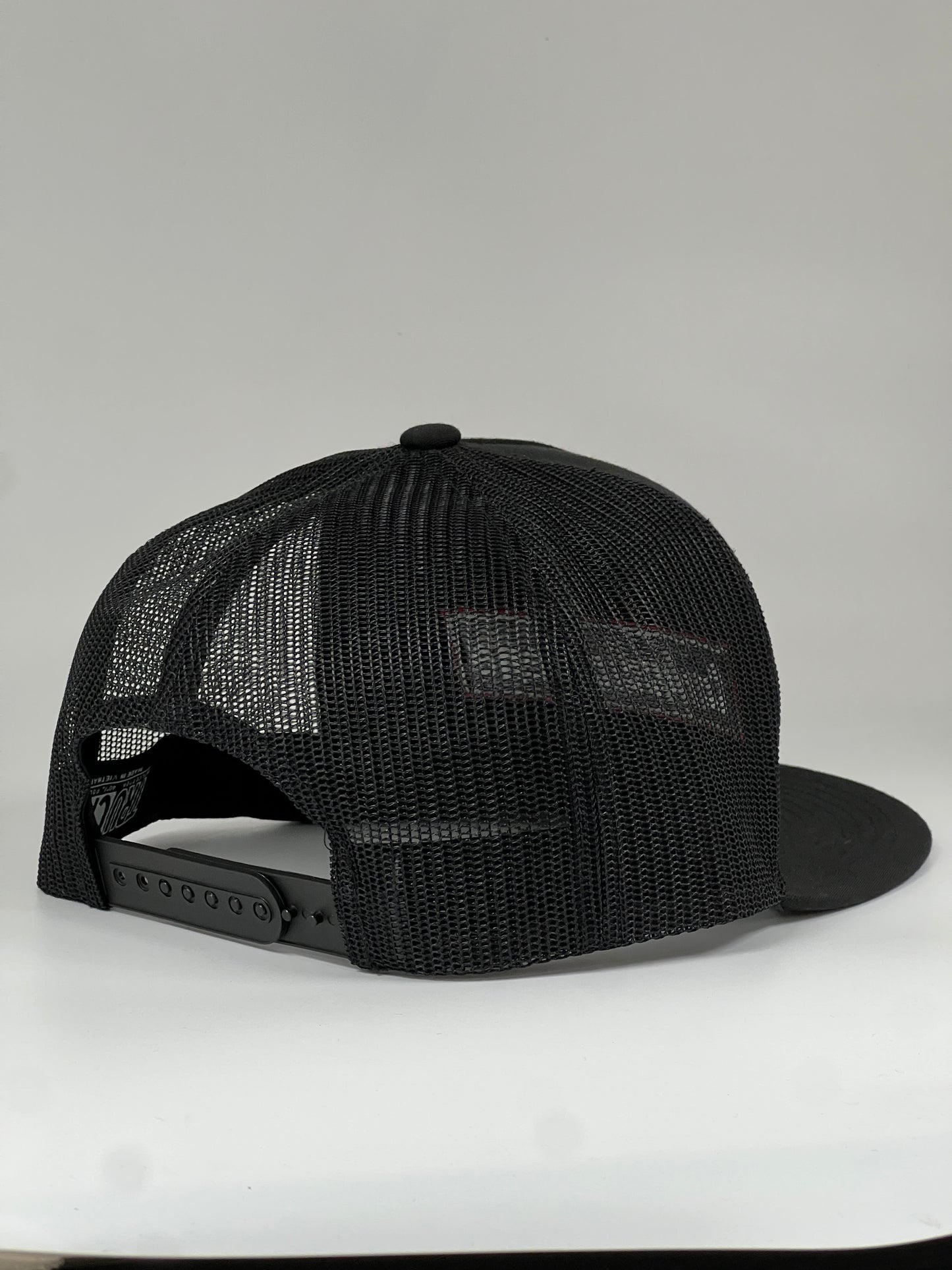 Flat bill 5 panel black with rear mesh snap back cap
